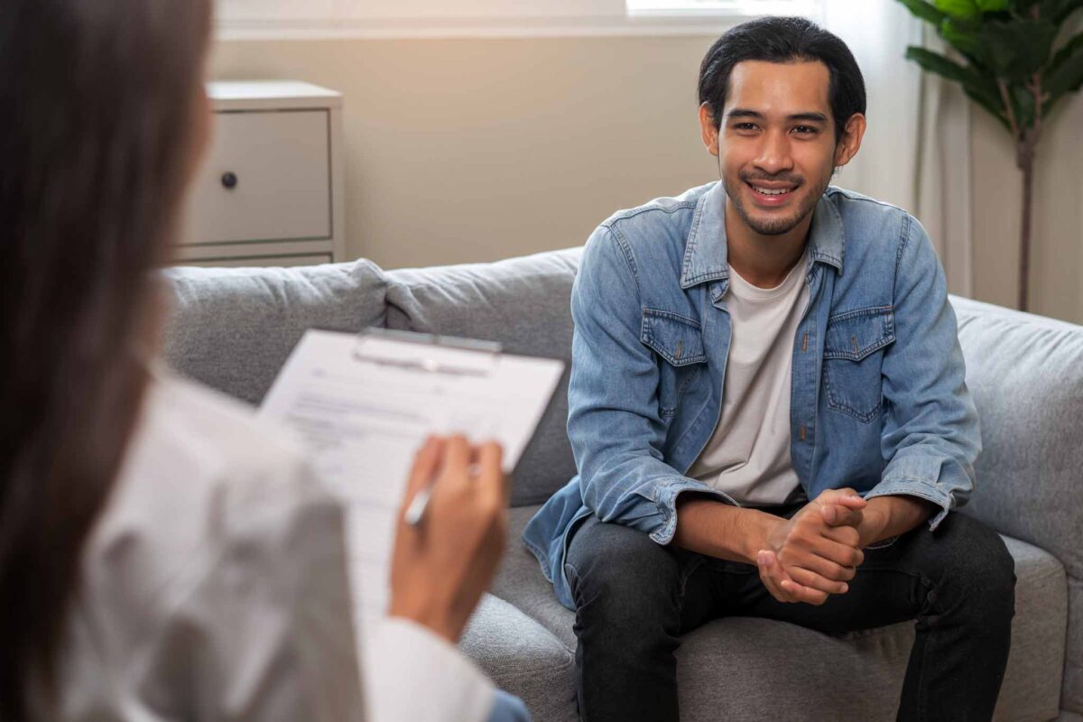 young man meeting with a psychiatrist after detox and rehab
