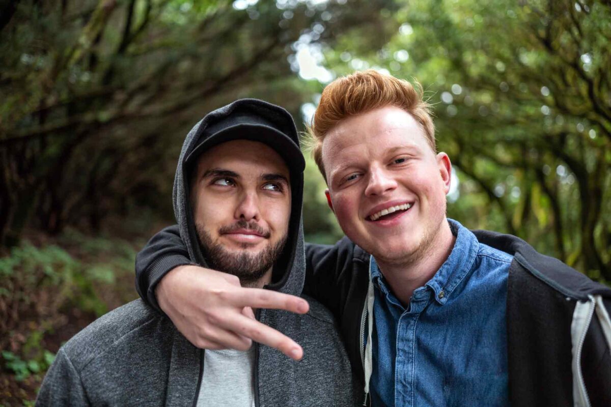 two friends on a hike in recovery living a happy life beyond addiction