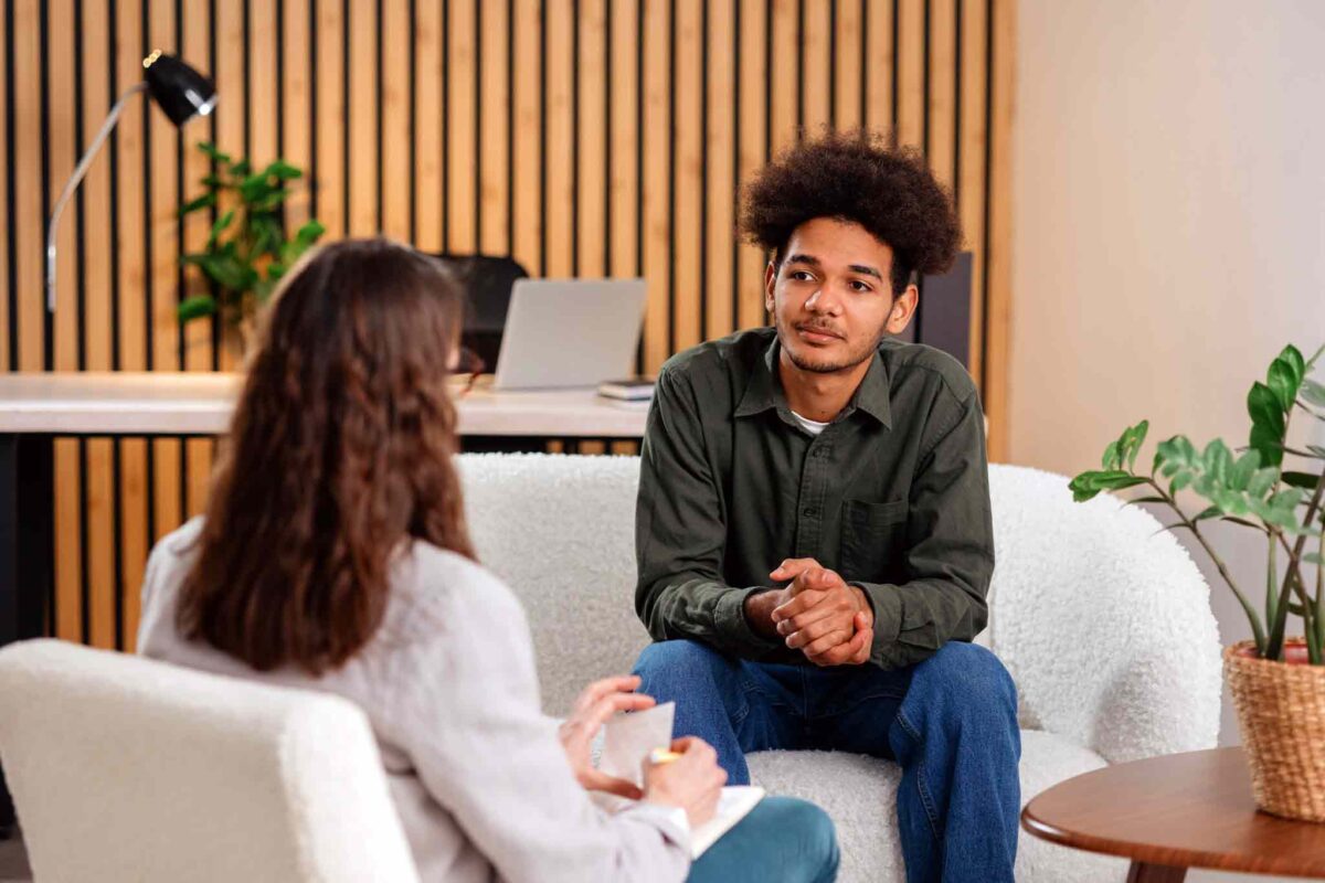 young man receiving psychiatry and mental health support for addiction